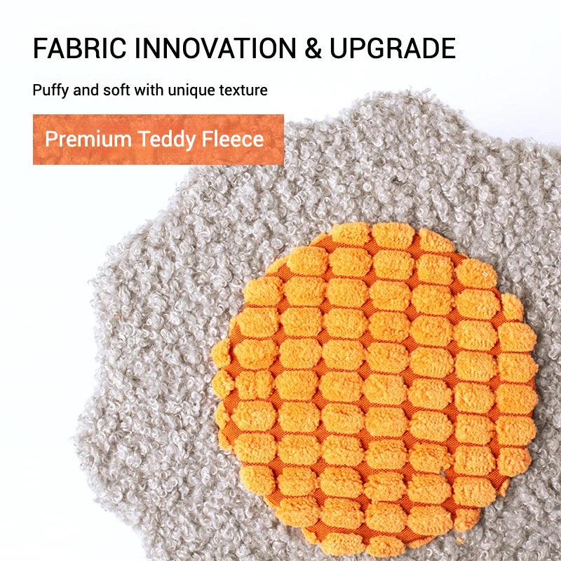 Orange textured fabric sample on a gray background with text about fabric innovation and premium teddy fleece.