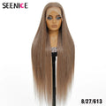 A long, straight wig displayed on a mannequin head stand against a plain white background. The wig has a warm medium brown color with subtle golden and caramel highlights.