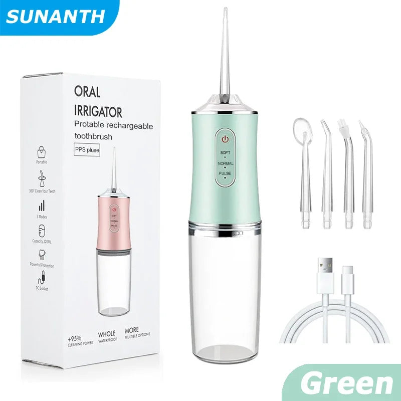 Green oral irrigator with packaging and accessories on a white background