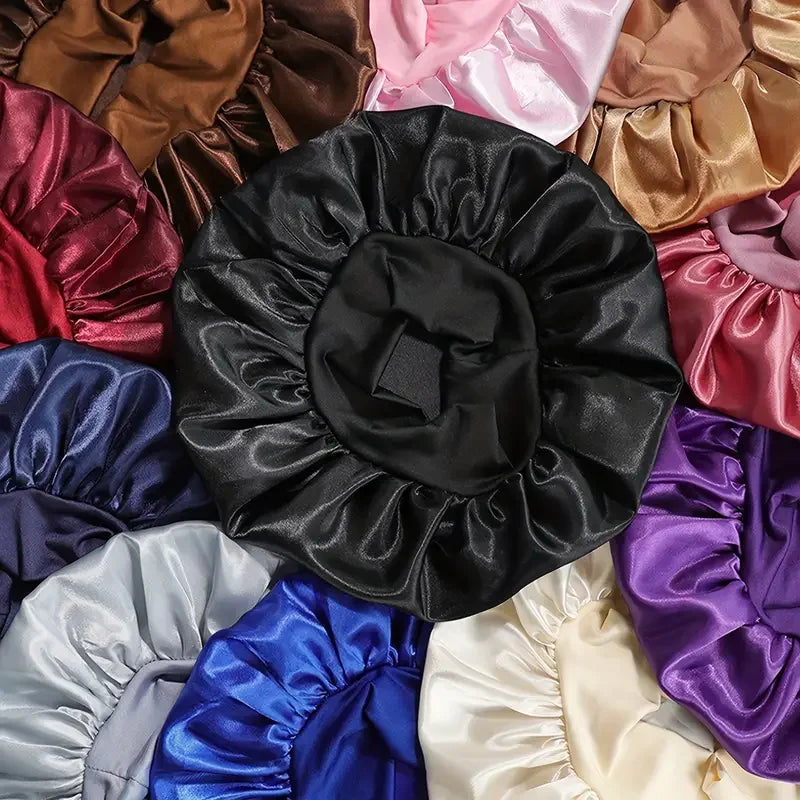 Black satin bonnet surrounded by multicolored satin bonnets.