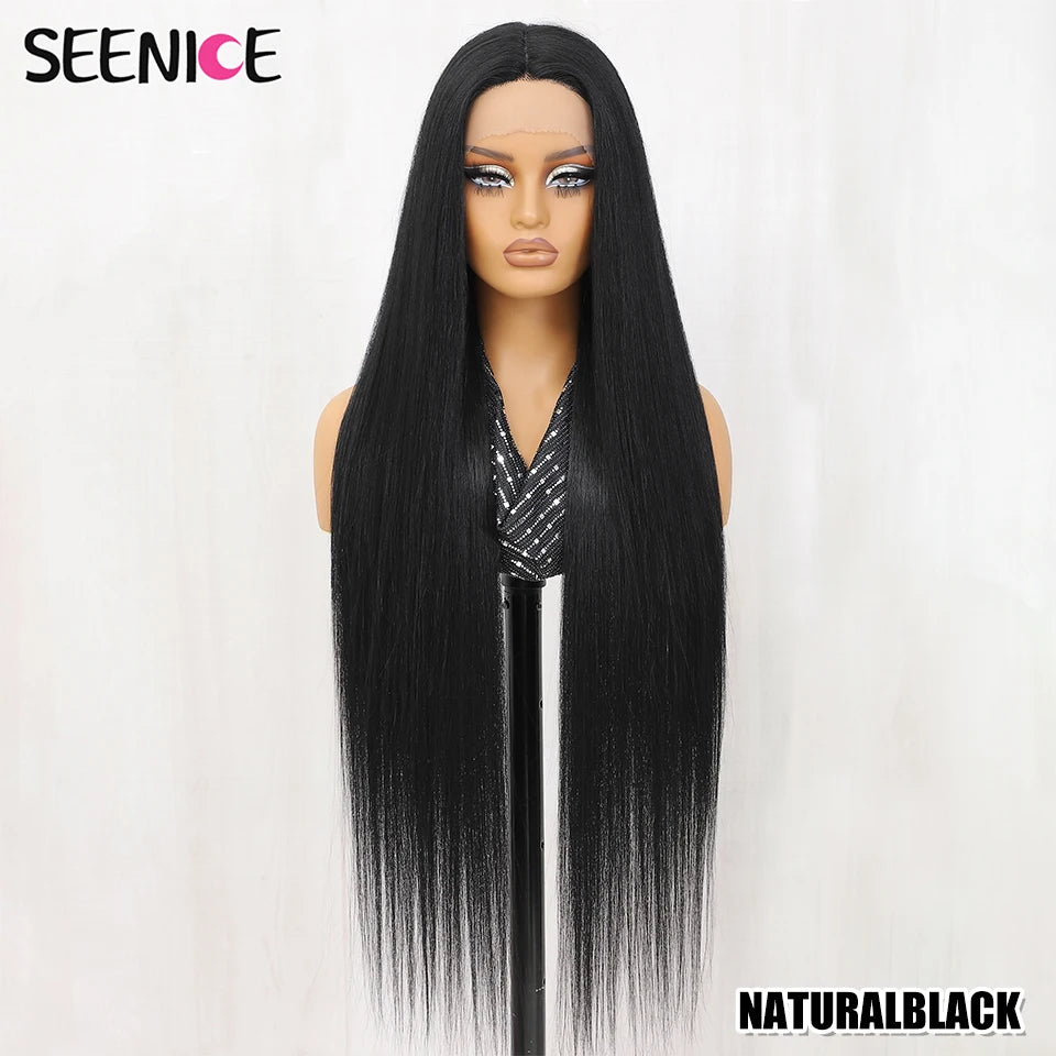 A long, straight, black wig displayed on a mannequin head against a plain light background. The brand name 'SEENICE' is visible in the top left corner, and 'NATURALBLACK' is written in the bottom right.