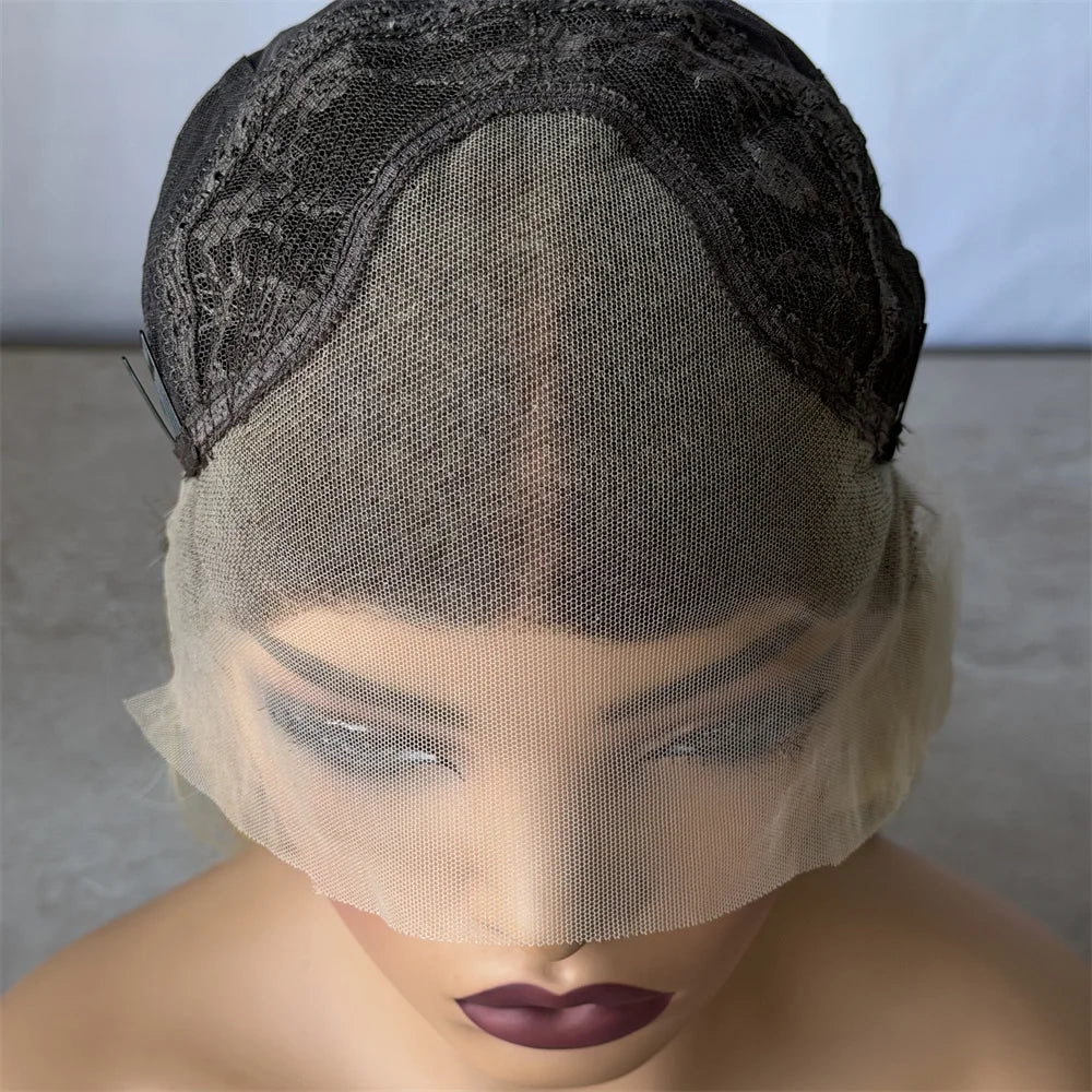 Mannequin head with a wig featuring a black lace front and beige mesh cap.