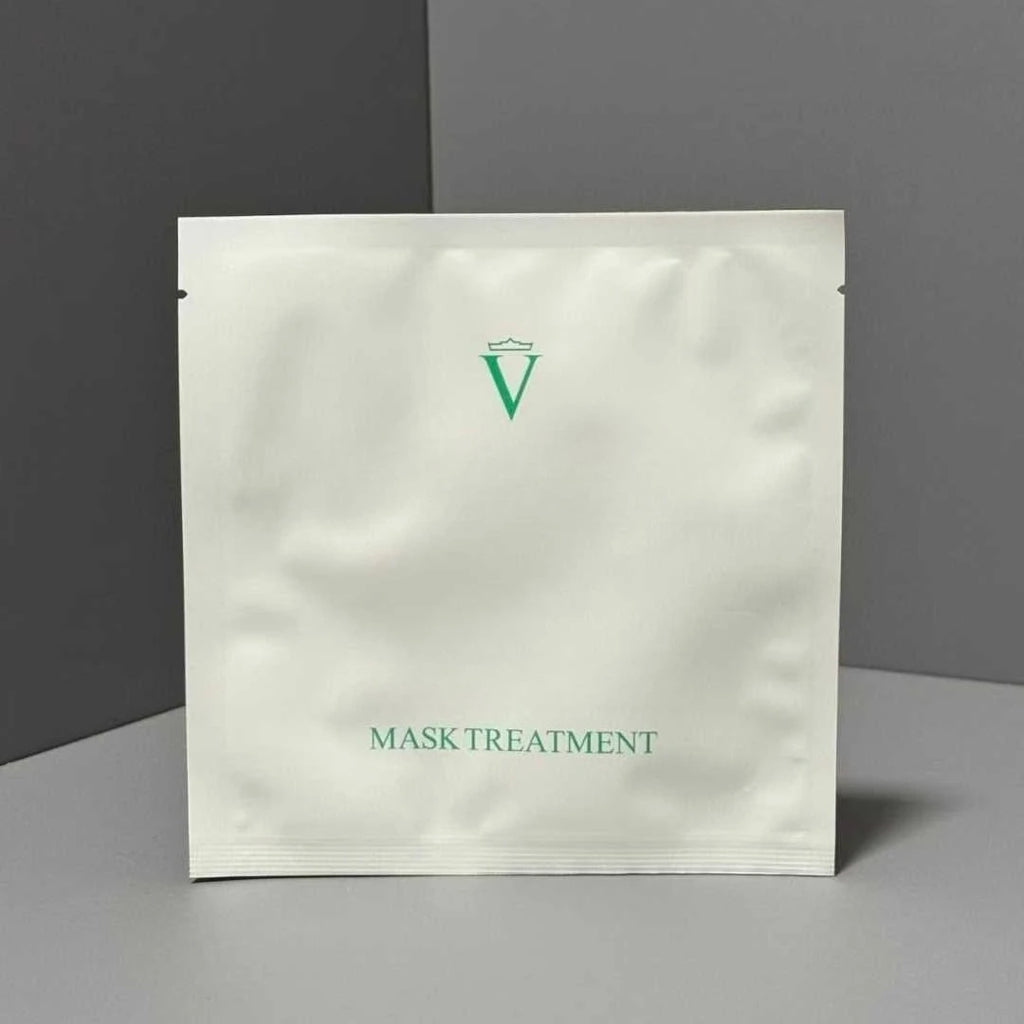 Mask treatment package with a green logo on a gray background