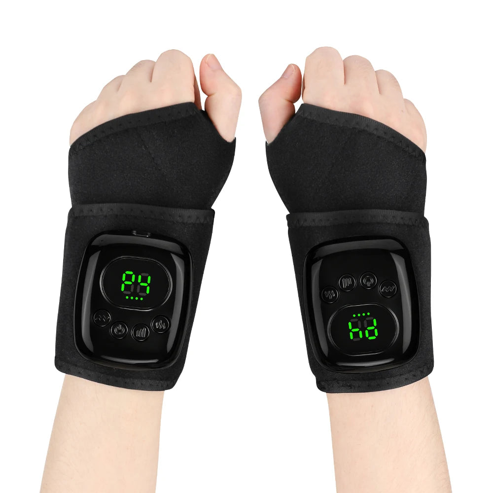 A pair of black wrist/forearm smart cuffs worn on two human wrists, shown against a plain white background. Each cuff has a black control panel with a green digital display.