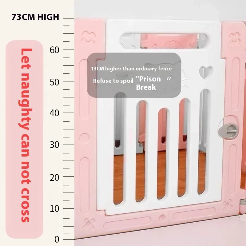 Pink and white plastic pet playpen gate with height measurement markings and text overlays indicating 73CM height and safety features.