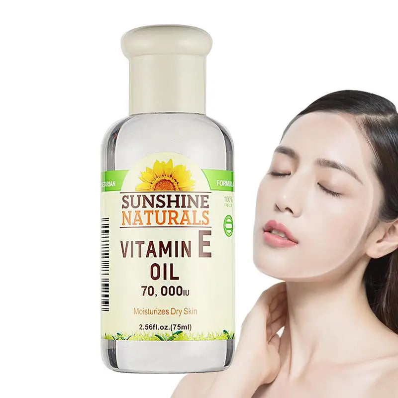 Sunshine Naturals Vitamin E Oil bottle with a model using the product on a white background