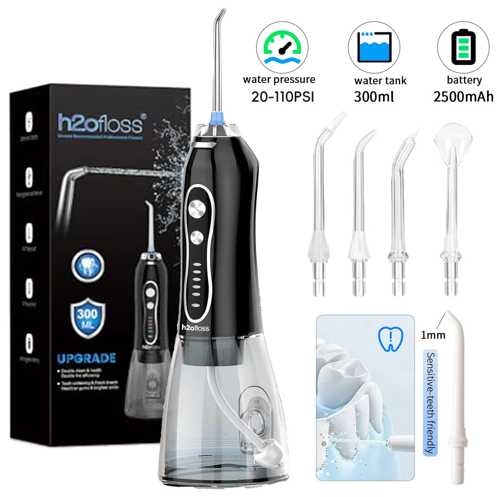 Black water flosser with packaging, nozzles, and a dental model card on a white background