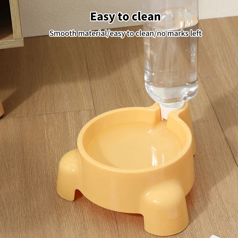 Yellow pet water bowl with a bottle pouring water on a wooden floor, labeled 'Easy to clean'.