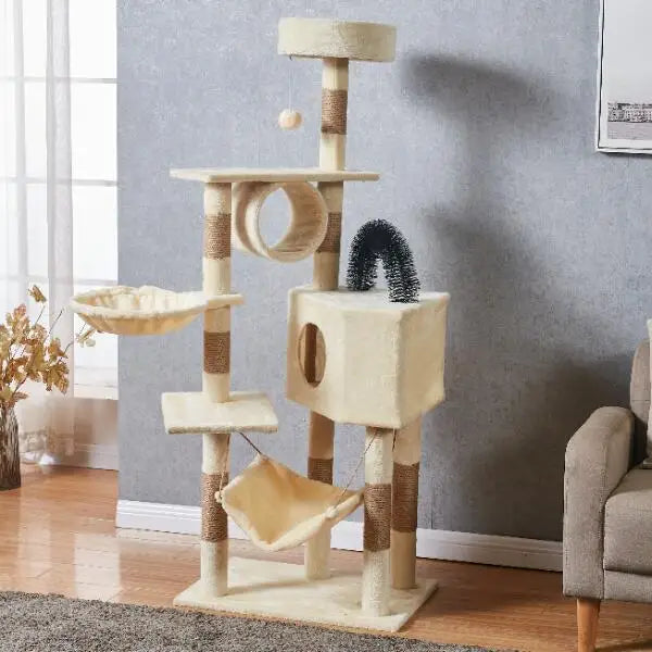 Cat tree with multiple levels, platforms, and a hammock in a room setting.