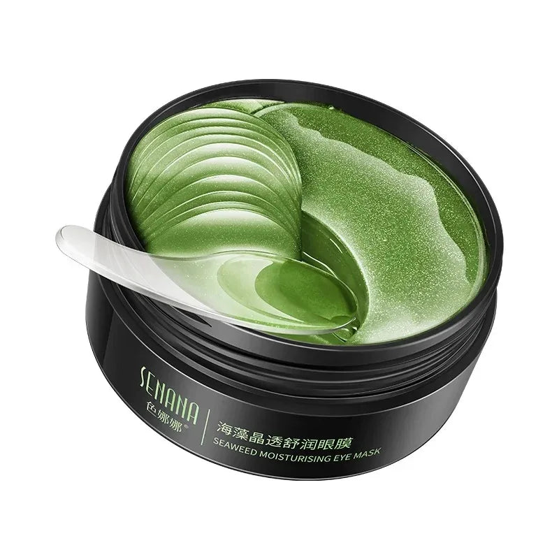 Seaweed moisturizing eye mask in a black container with a spoon on a white background