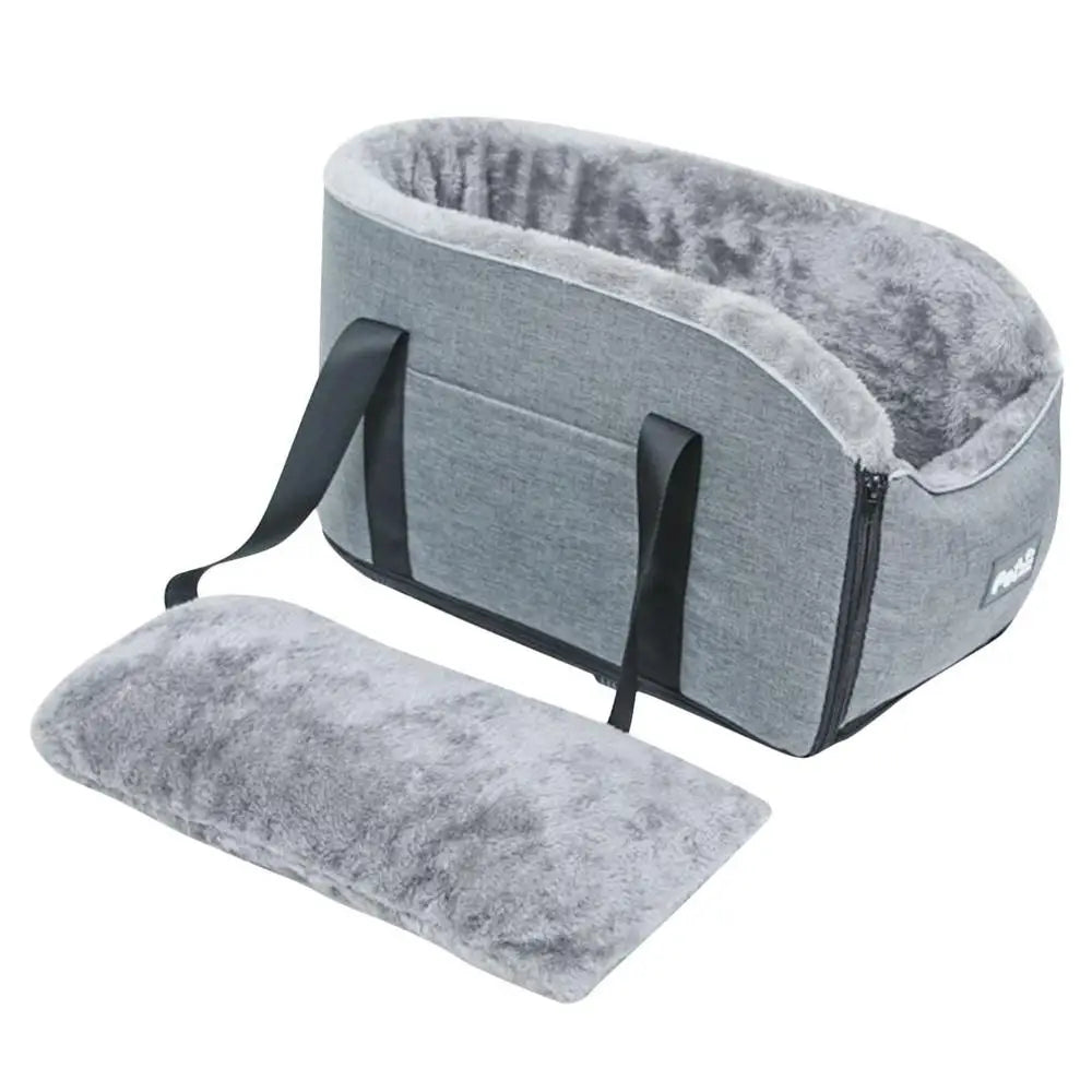 Gray pet carrier with a cushion on a white background