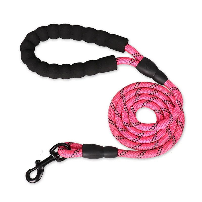 Pink dog leash with black handles on a white background