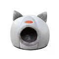 Gray pet bed with cat ears on a white background