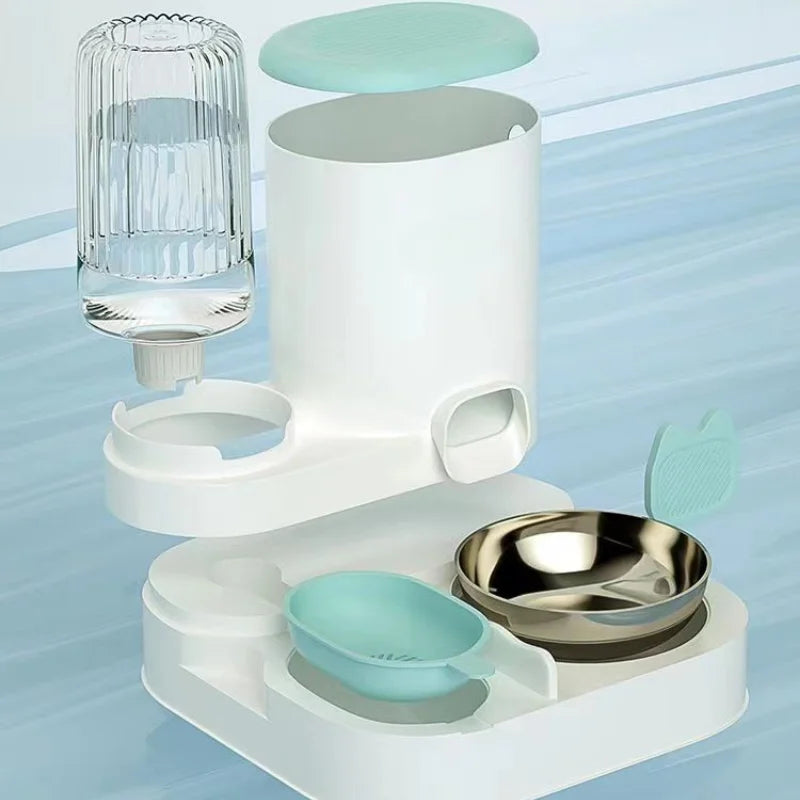 Pet water fountain and bowls on a light blue background