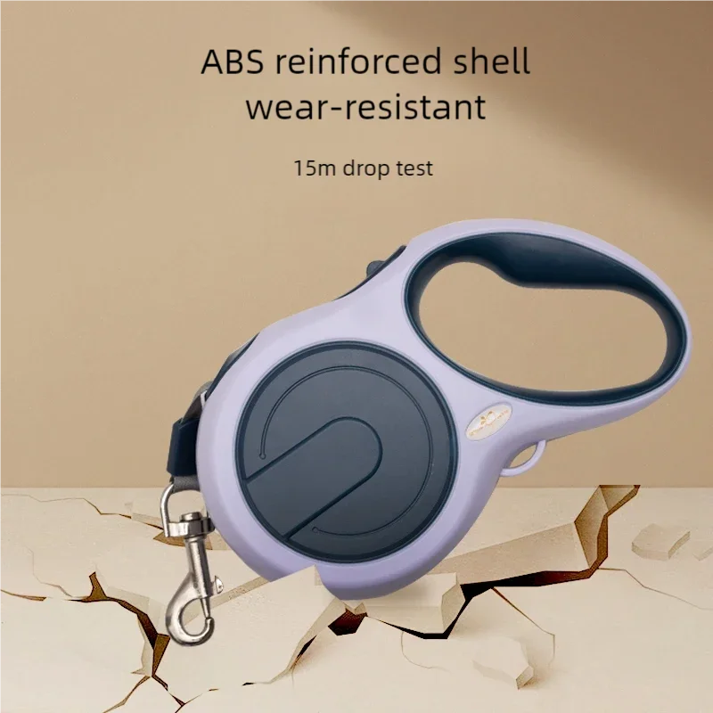 Retractable dog leash with ABS reinforced shell on a beige background
