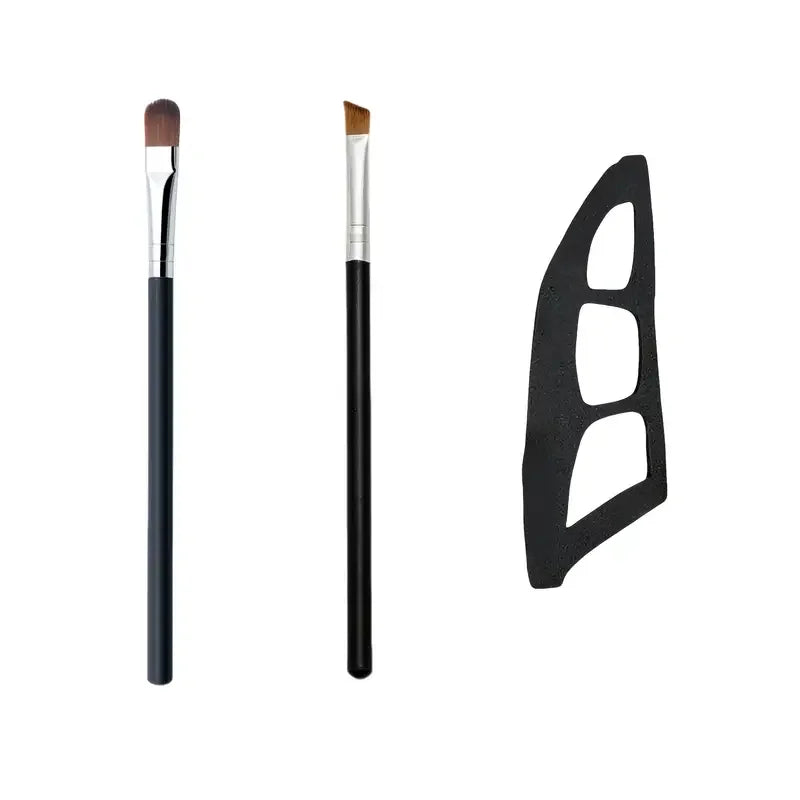 Two makeup brushes with black handles and white bristles, one with a black stand on a white background.