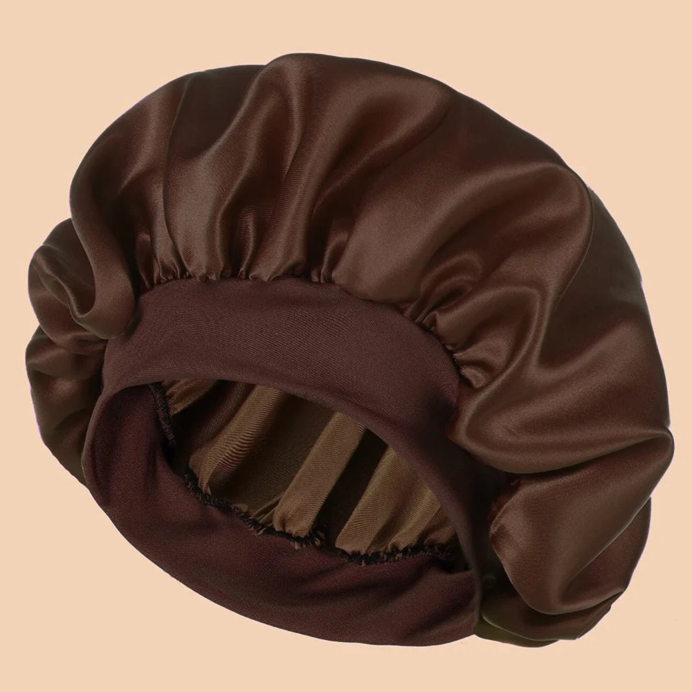 Brown satin hair bonnet on a beige background
