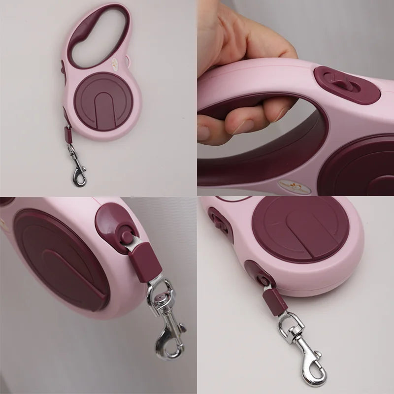 Pink and purple retractable dog leash with handle and clip on a white background