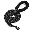 Black dog leash with a paw print design on a white background