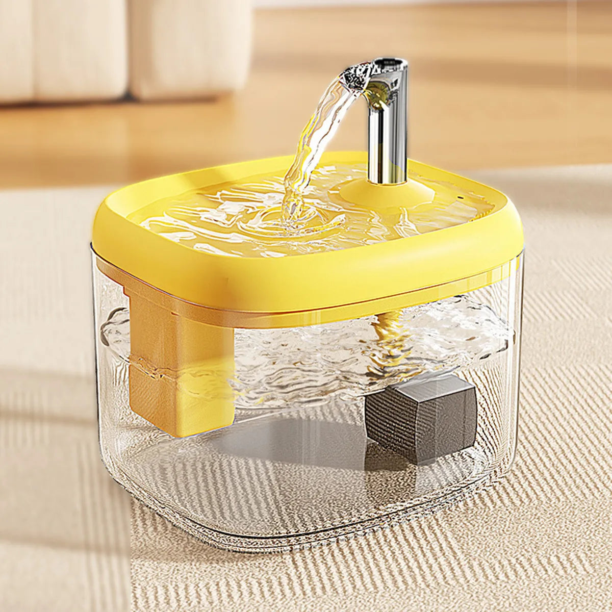Clear container with a yellow lid and water flowing out, on a light wooden surface.