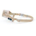 Beige dog muzzle with metal mesh on a white background