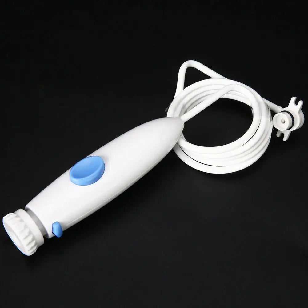 A white electric toothbrush with a blue button and white cord, shown on a solid black background.