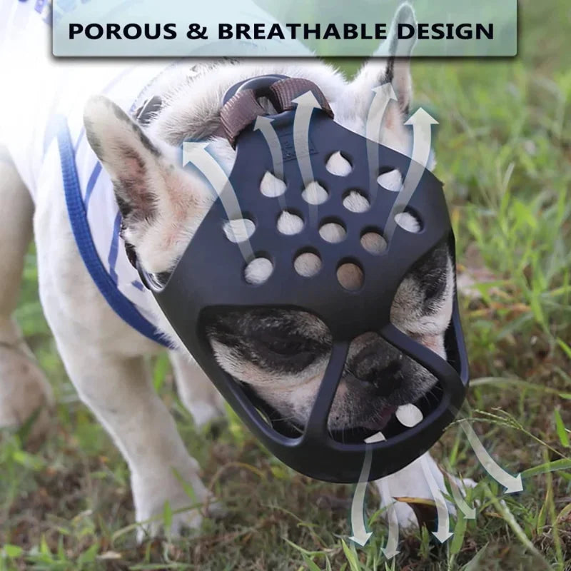 Dog wearing a black muzzle with text 'Porous & Breathable Design' in an outdoor setting.