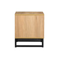 Wooden side table with black base on a white background