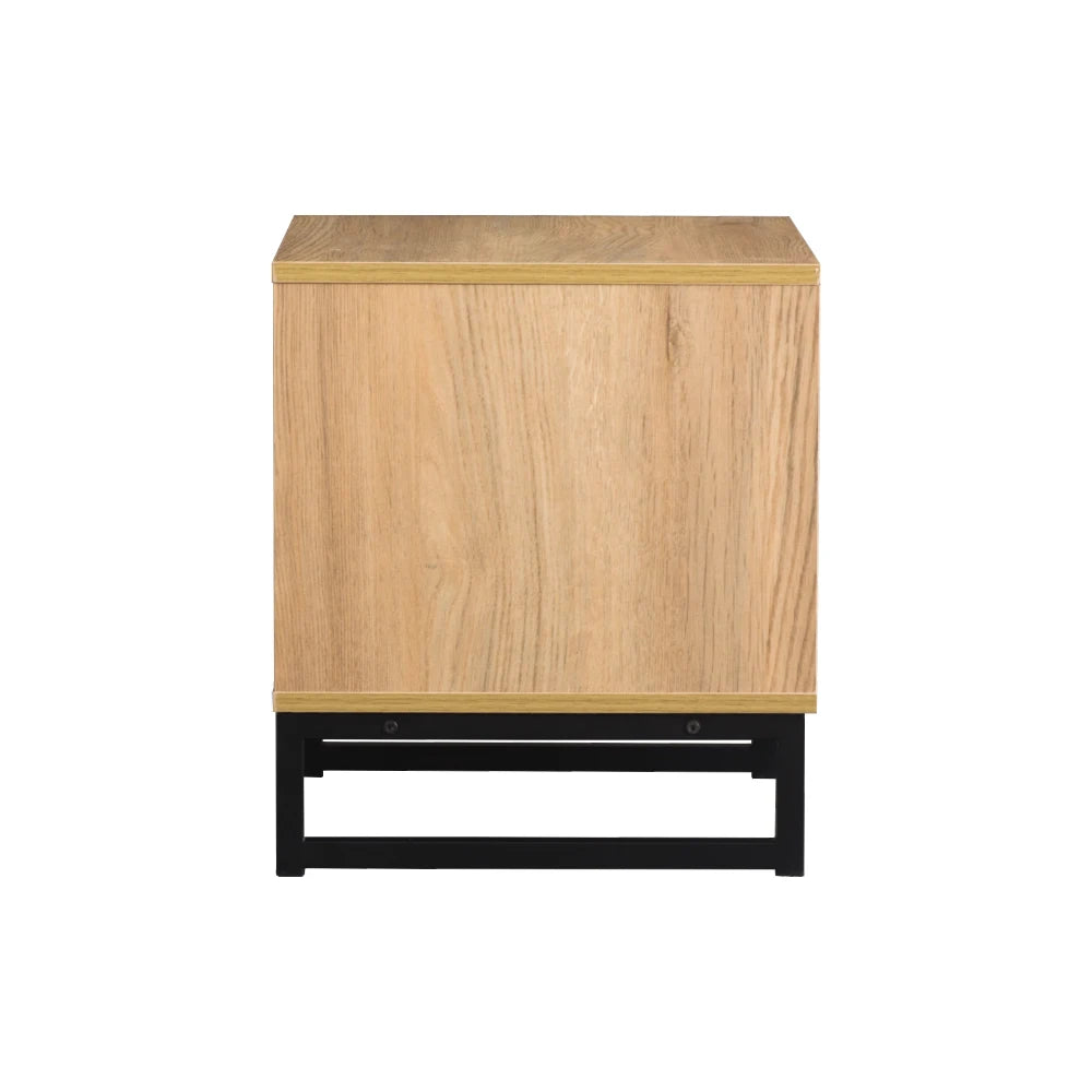 Wooden side table with black base on a white background