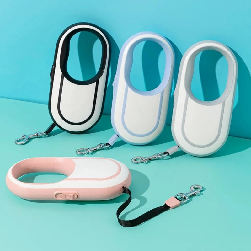 Set of four dog leashes with different color schemes on a light blue background