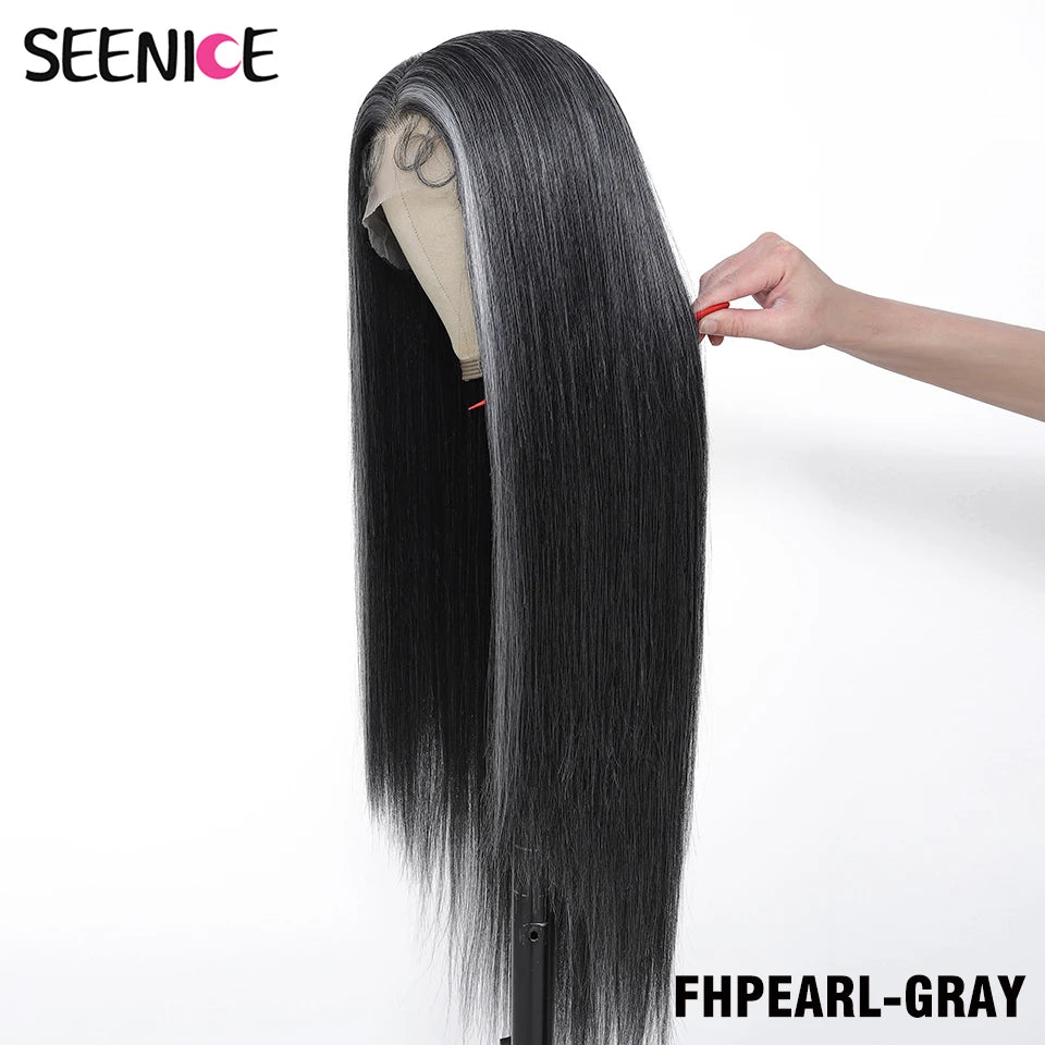 A long, straight wig displayed on a mannequin head against a white background, with a hand holding a section of the hair to show its texture and color. The brand name 'SEENICE' is visible in the top left, and the text 'FHPEARL-GRAY' is in the bottom right.