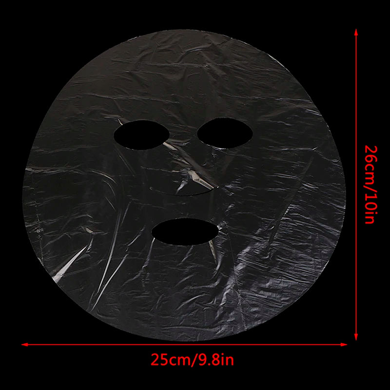 Round black object with three holes and measurements on a black background