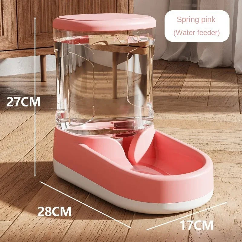 Pink pet water feeder with dimensions on a wooden floor