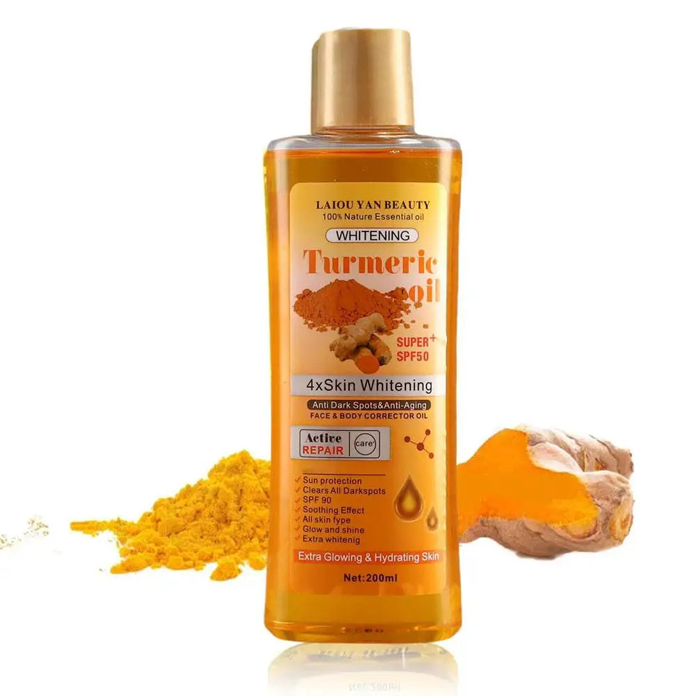 Bottle of Turmeric oil with turmeric powder and a piece of turmeric root on a white background
