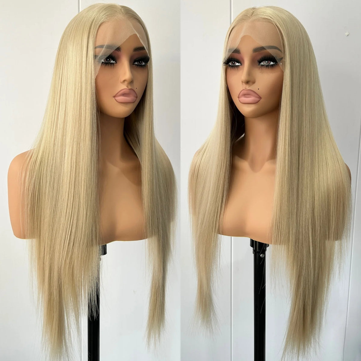 Two mannequin heads wearing straight, shoulder-length blonde wigs with a full lace frontal, shown side by side against a plain white background.
