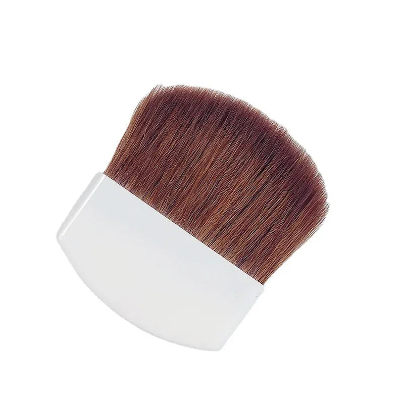 Makeup brush with brown bristles and white handle on a white background