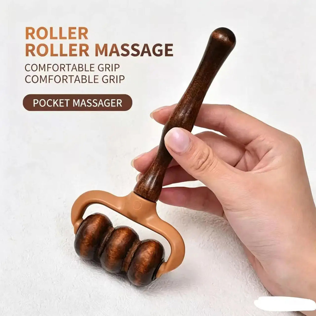 A hand holding a wooden roller massage tool with dual rounded wooden rollers and a brown handle, shown against a light textured background with promotional text reading 'ROLLER ROLLER MASSAGE' and 'POCKET MASSAGER'.