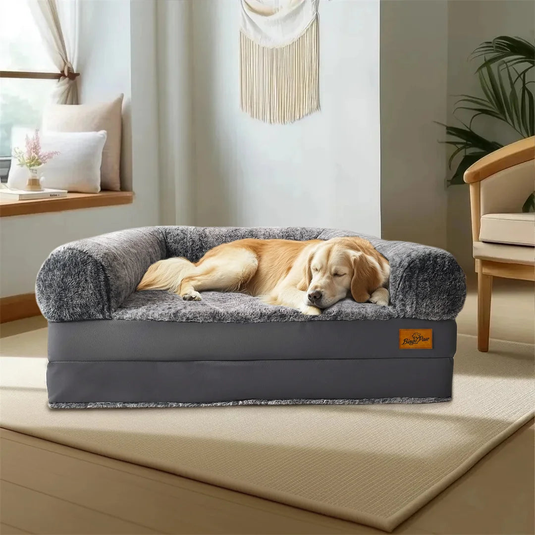 Dog lying on a gray pet bed in a cozy living room.