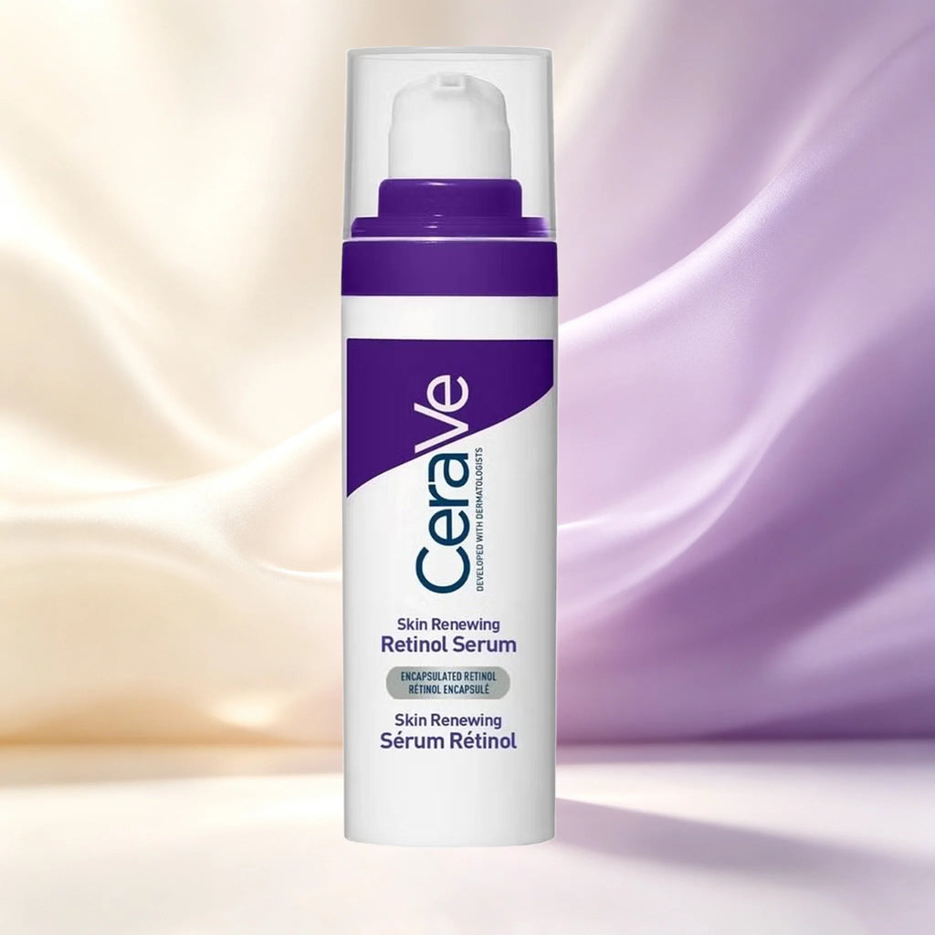 CeraVe Skin Renewing Retinol Serum in a white pump bottle with a purple cap and purple label accents, centered against a soft beige and lavender satin background.