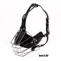Black leather dog muzzle with metal wire cage on a white background