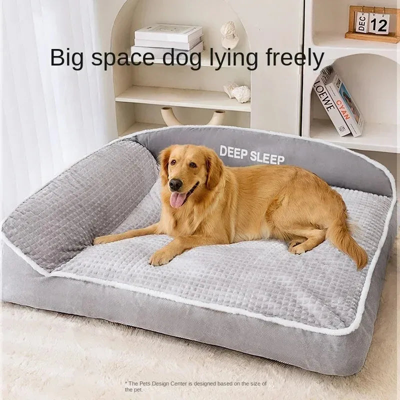 Dog lying on a large gray pet bed with 'DEEP SLEEP' text, in a room setting.