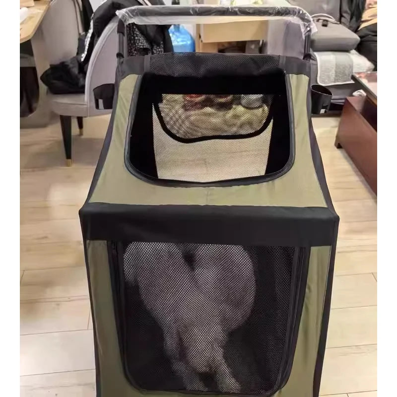 Pet carrier with a dog inside on a wooden floor.
