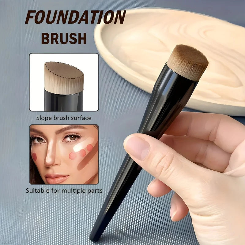 Foundation brush with a hand holding it, showing its use on a face and slope brush surface.