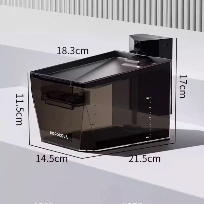 A dark translucent rectangular container or aquarium-style vessel shown with overlaid dimension labels and measurement lines indicating 18.3 cm top, 17 cm height, 11.