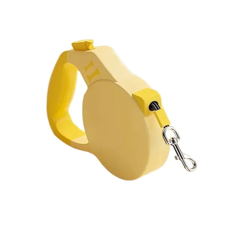 Yellow retractable dog leash on a white background