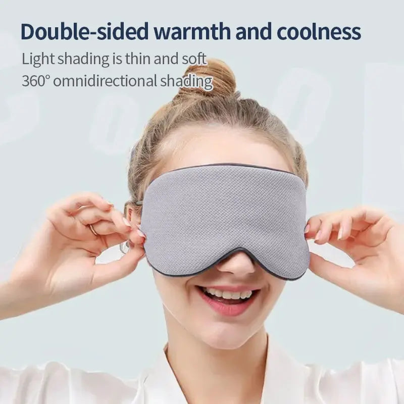 Person wearing a gray sleep mask with text about its features on a light background