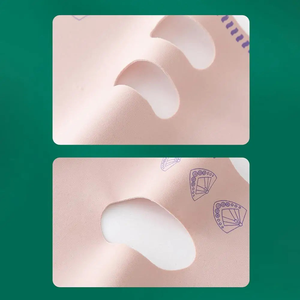 Two pink silicone pads with white silicone wings on a green background