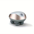 Gray and rose gold handheld massager on a white background