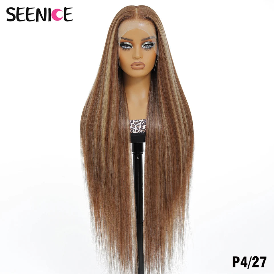 A long, straight wig with highlighted brown and blonde streaks displayed on a mannequin head stand against a plain white background. The brand name 'SEENICE' is visible in the top left corner, and the style code 'P4/27' is in the bottom right.