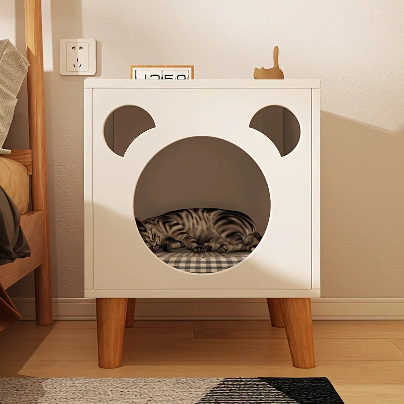 White cabinet with cat-shaped entrance in a room setting